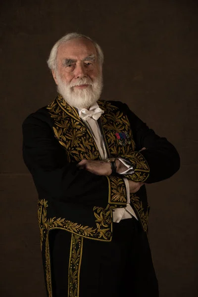 Portrait of Pierre Carron in his academician’s uniform by Yann Arthus-Bertrand, shown in 2019.
